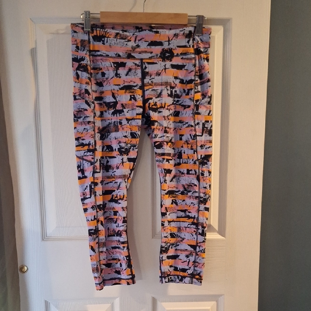 Lululemon Speed Up Crop Orange and Pink Leggings Vibrant Abstract Design